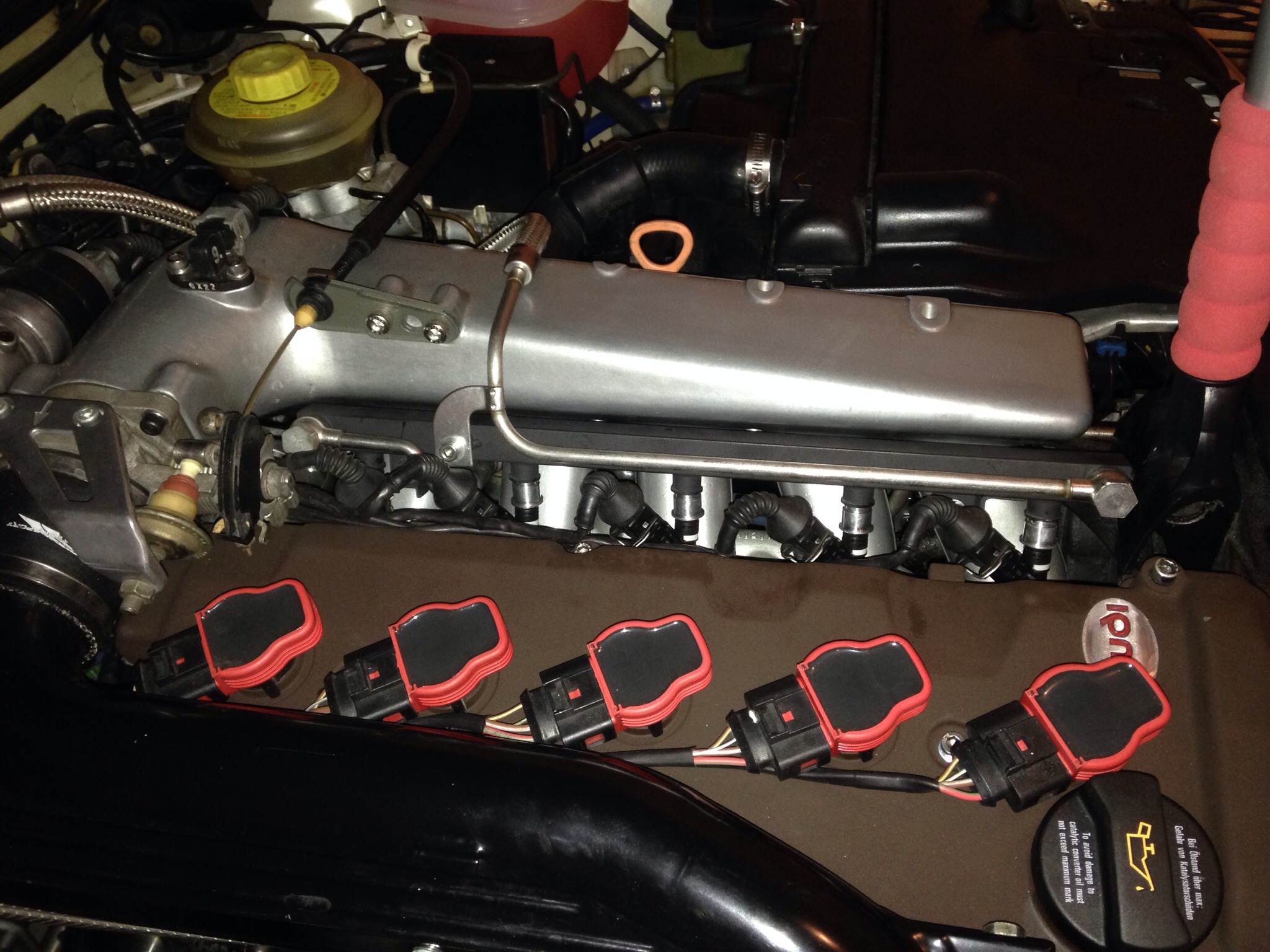 Fuel rail buttoned up with adapters in place