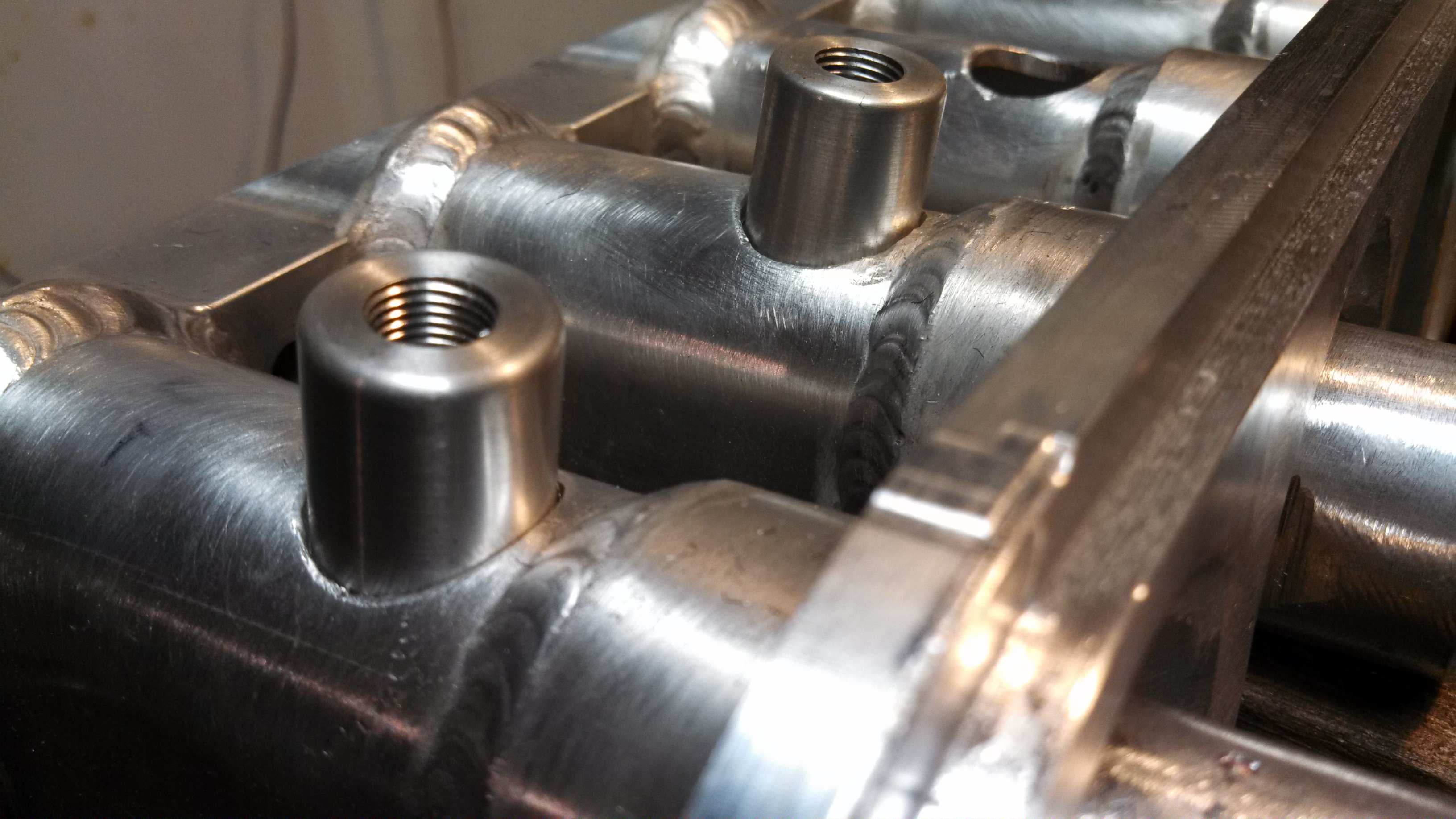 water methanol bungs ready to weld.jpg