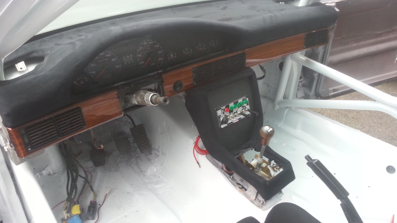 driver's position.  We stripped the car completely of the sound deading, lots or work.  The interior is painted with Dupont single stage factory pack white