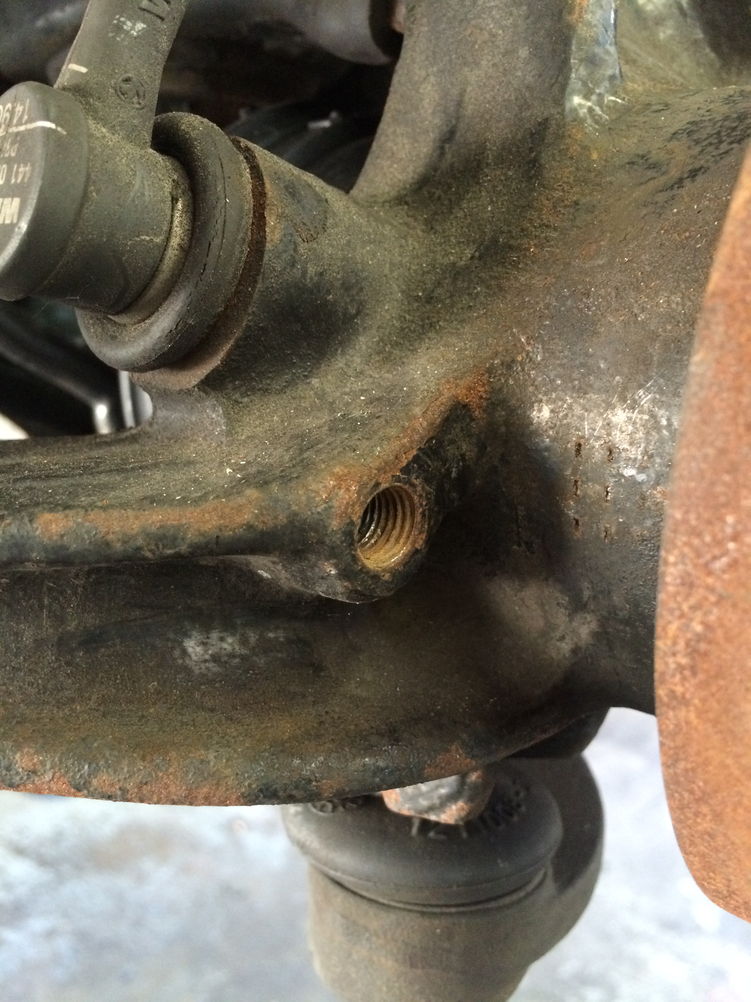 Lower mounting hole drilled &amp; tapped.