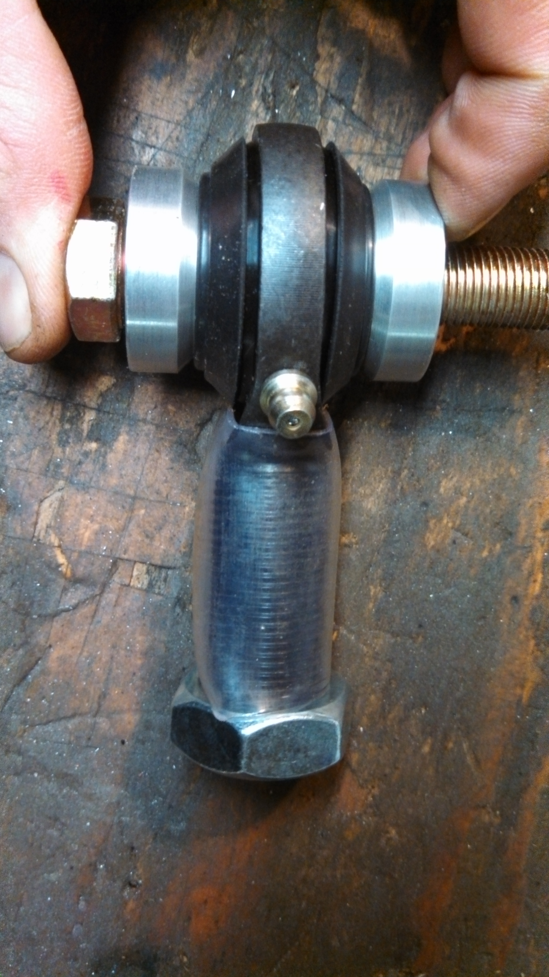 c-arm rod end with spacers and seals.jpg